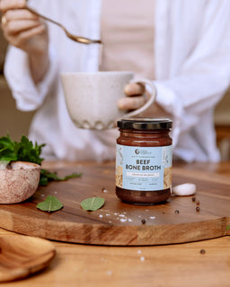 Beef Bone Broth Natural Nutra Organics product on a chopping board